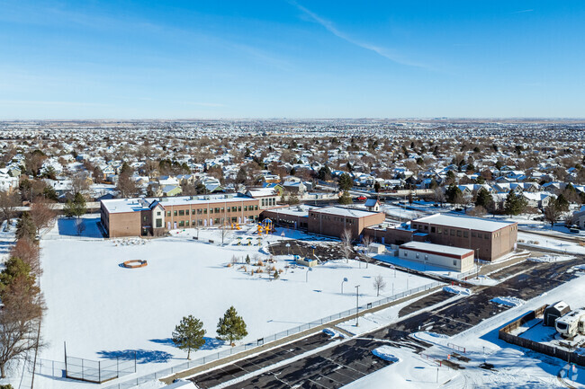 An overview of the rear outdoor play area at Frassati Catholic Academy in Thornton, Colorado.