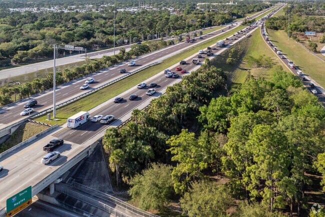 i75 Runs right past San Carlos park and is accessed by two exits