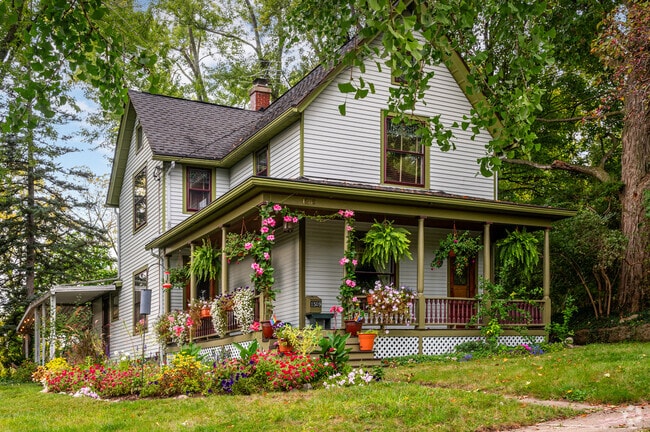Single famly home with colorful flowers in the Broadway neighborhood in Ann Arbor.