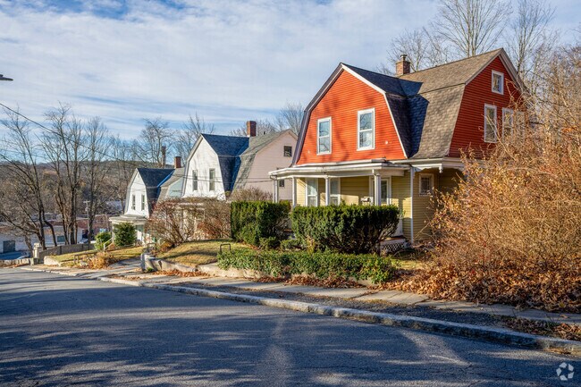 A row of Dutch style homes in Cleghorn are situated on a hillside above the Nashua River.