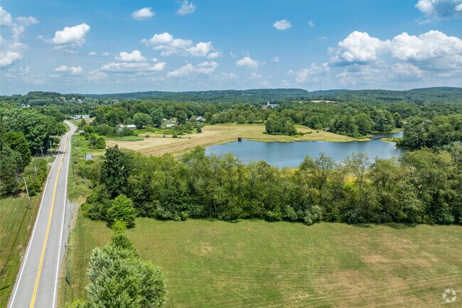 Route 92 is the main road through Arthurdale and goes past Fairfax Pond.