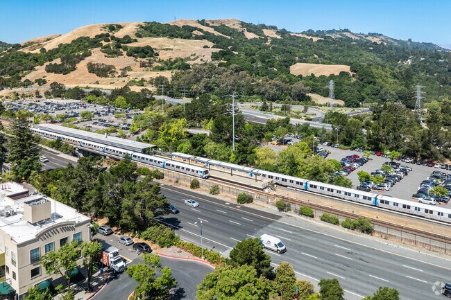 Commuters board BART at Orinda Station for quick access to Oakland and San Francisco.