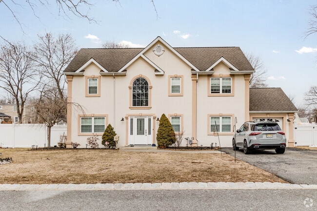Single-family homes, such as this Colonial Revival, usually sell for a median price of $690,000.