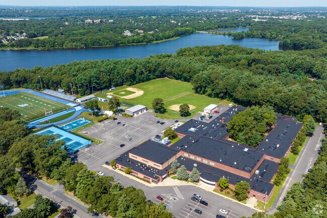 This aerial view of Seekonk High School in Seekonk shows athletic fields and proximity to lakes.
