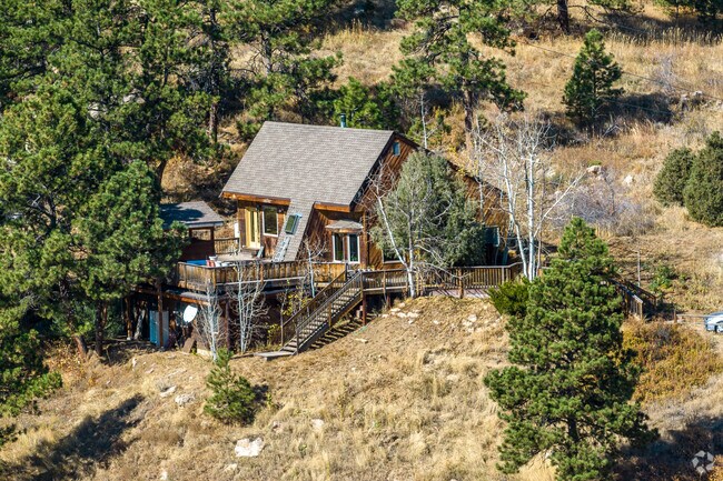 Log cabins with ample land are popular in the mountainous area of Golden Gate Canyon.