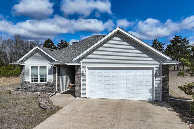 On the outskirts of Baxter, new construction homes with modern designs are prevalent.