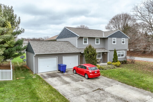 A renovated split-level home in Troy, Delaware, with a two-car garage.