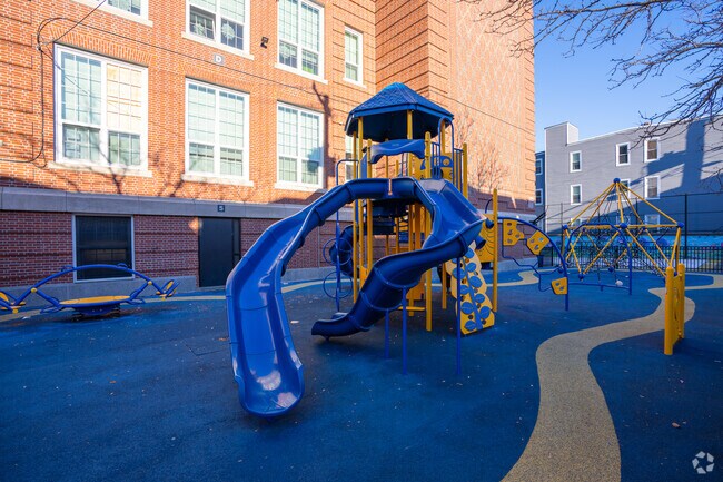 James Otis Elementary School in East Boston has a couple of fun slides.