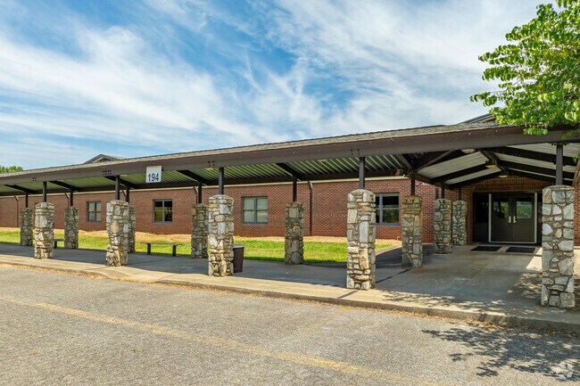 Bus riders have a secure and dedicated drop-off and pick-up area at Liberty Middle School.