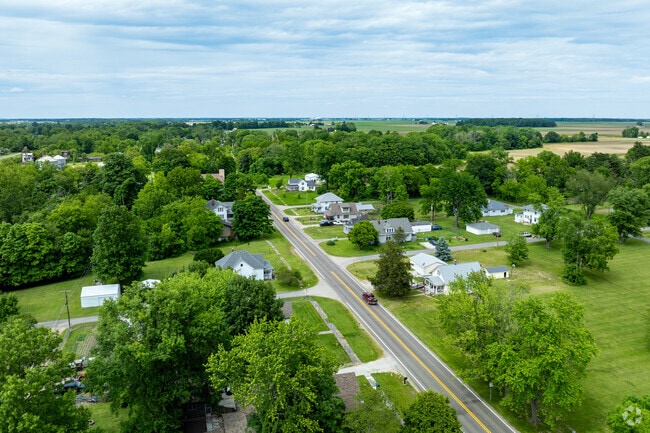 Saint Bernice main street travels by homes of all sizes, many with large lots.
