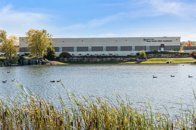 Mayo Family Clinic near Hart Farms offers peaceful views of a serene pond and waterfall.