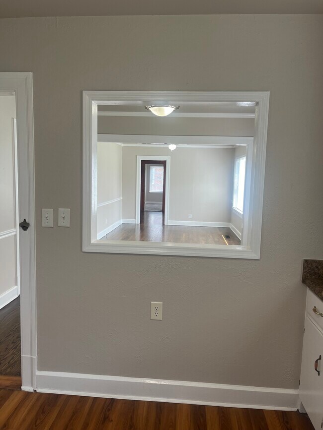 View from kitchen into dining room and living room
