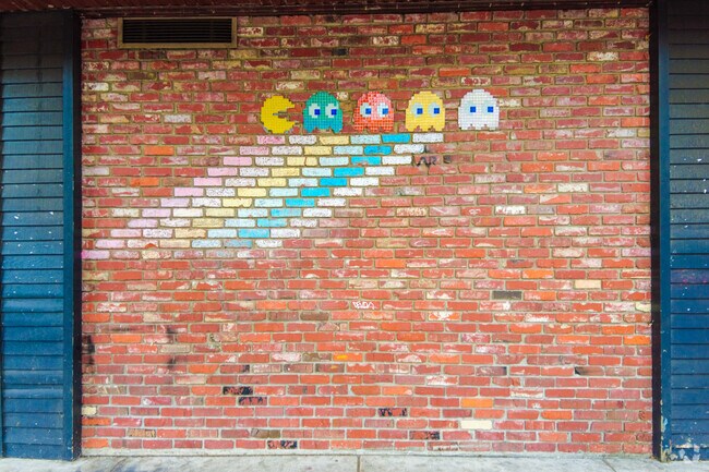 Space Invaders mural is emblazoned on a wall in Downtown Tacoma.