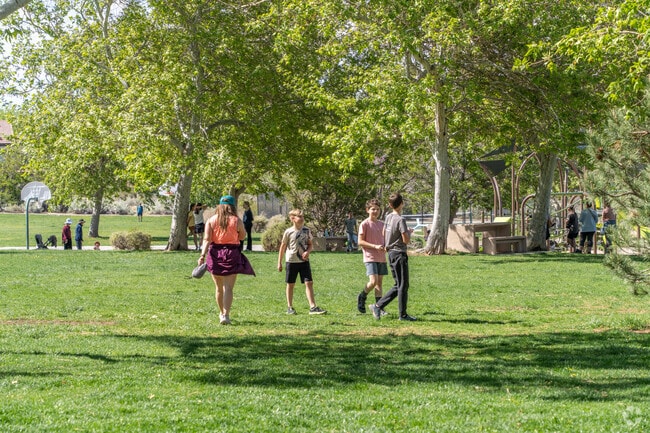Expansive grass fields at High Desert Park near Antelope Run are perfect for your family.