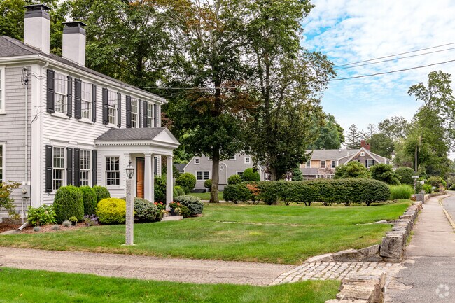 This row of homes in the Duxbury neighborhood shows antique Federal style homes.