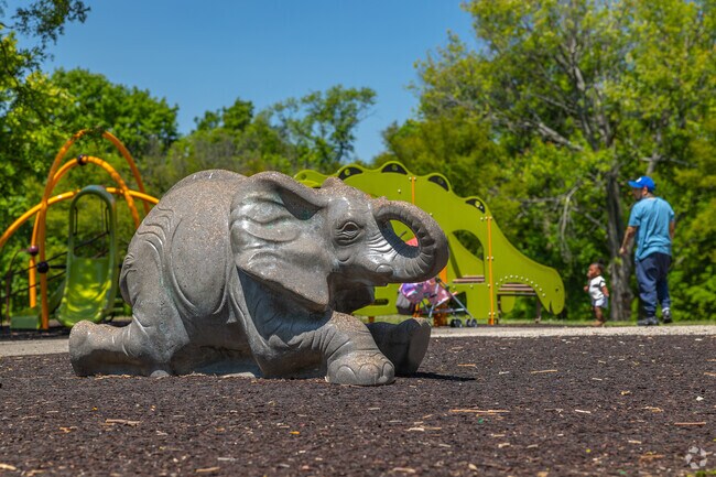 Kids can climb on animal statues and explore the jungle gym at Burholme Park in Fox Chase.