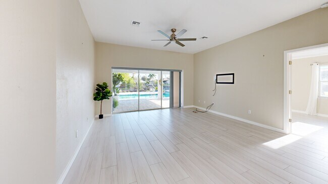 3446 Pinetree Dr, Saint James City, FL 33956 - photo 2