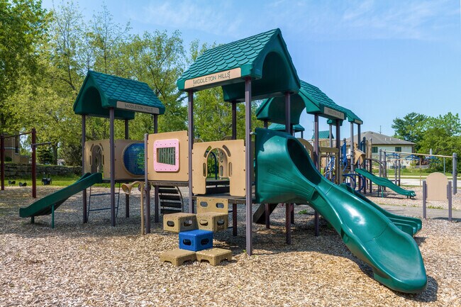 Kids can enjoy the playground at Middleton Hills Park, while parents relax in the shade.