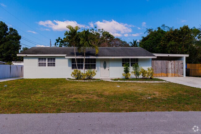 Charming modest ranch home in Royal Palm Estates.