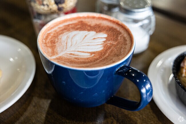 Warr Acres is close to the strawberry lattes at Provisions Coffee & Bakery.