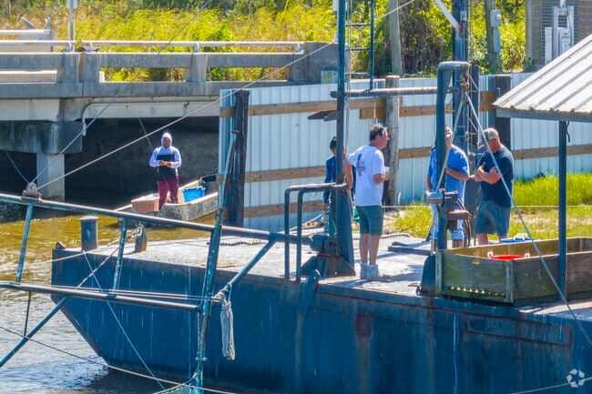 People can fish from the pier at David Chauvin's Seafood Company in Dulac.