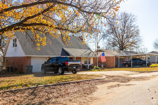 Mature trees are in the yards of many of the homes of Bristow.