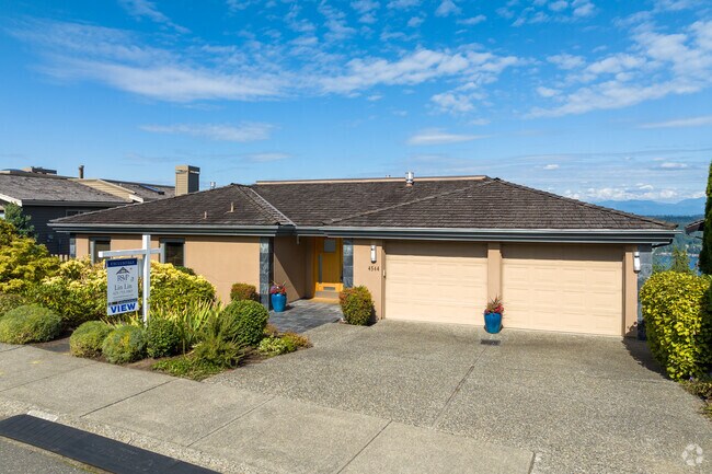 A perfect blend of luxury and nature with this Cougar Mountain residence.