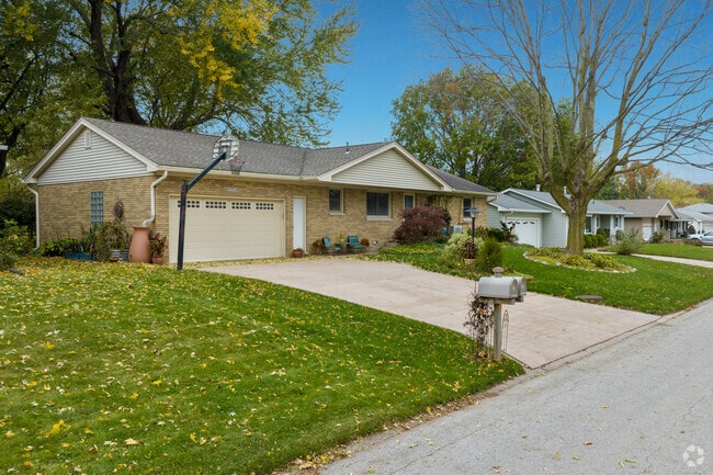 Large trees mix with homes in Coal Valley.