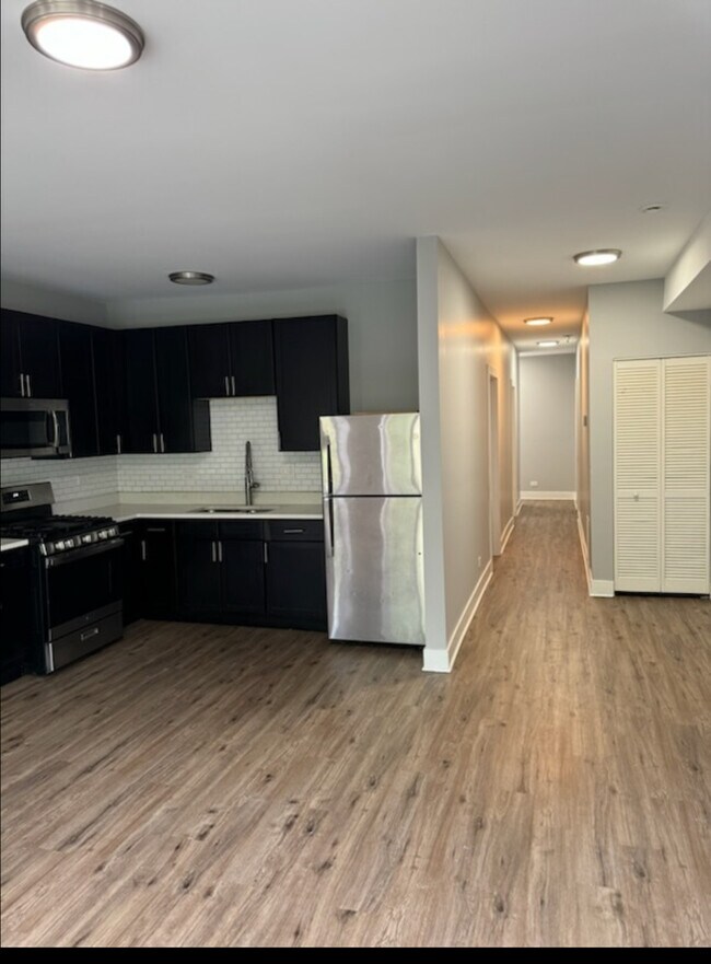 7944 S Ellis Ave, Chicago, IL 60619 - photo 2