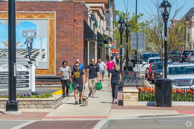 Residents of Green Acres enjoy a sunny day on the streets of Downtown Naperville.