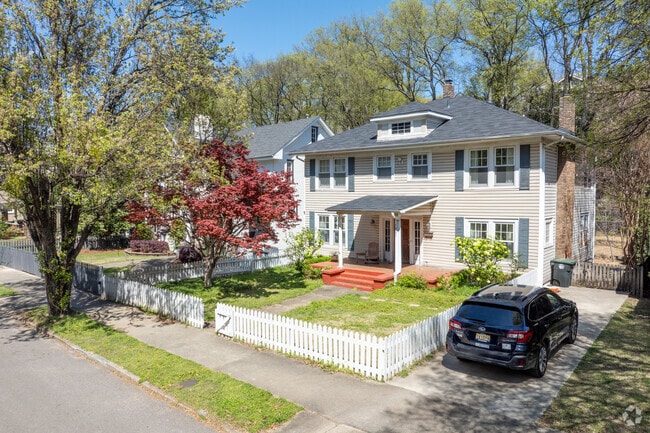 Walk down this picturesque sidewalk and enjoy the Japanese Maple blooms in Highland Park.