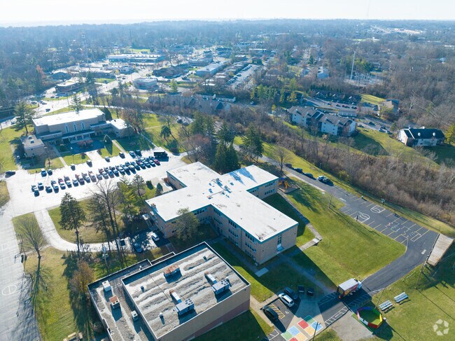 The John Paul II Catholic School is close to many homes and restaurants within the neighborhood