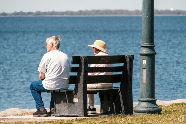 A retired St. Cloud couple enjoys soaking up sunshine on a beautiful day.