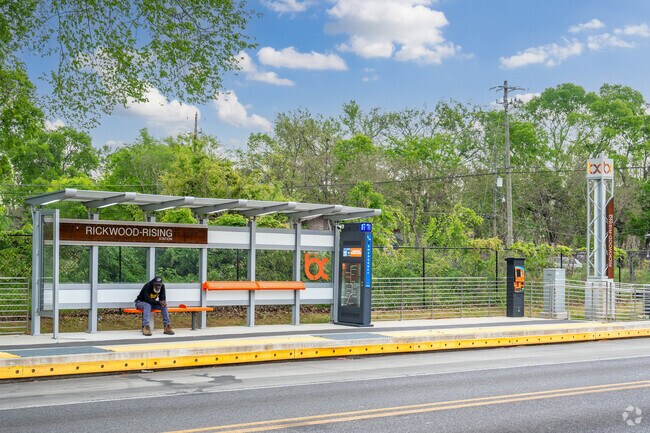 Get on a bus at one of the nice bus stops in Rising-West Princeton.