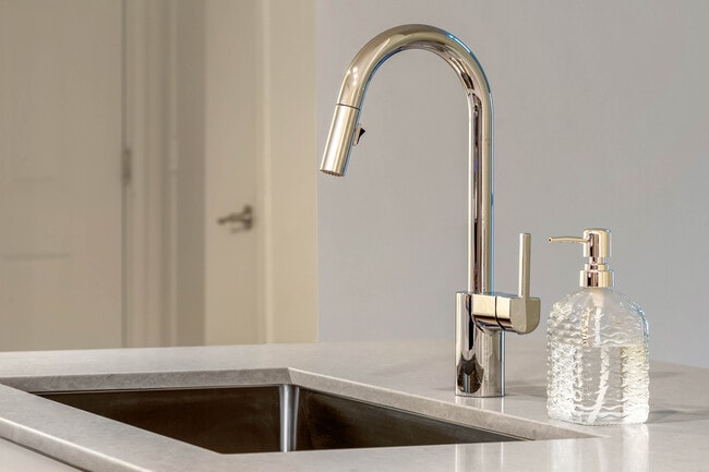 Renovated Package I kitchen with updated plumbing fixtures