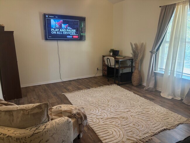 Living room and computer desk area