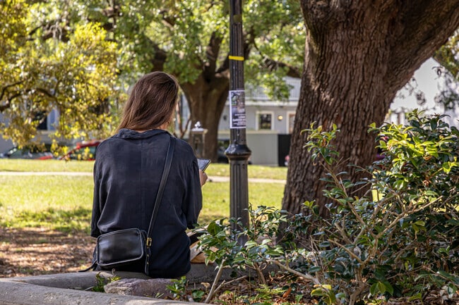 Coliseum Square Park offers shade and seating near Central City.