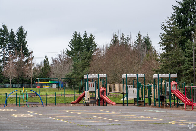 Play structure and basketball court behind Fishers Landing Elementary School.