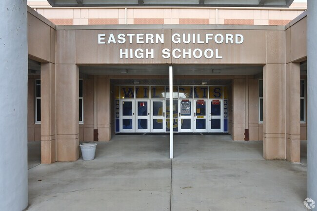 The average SAT score at Eastern Guilford High School, near McConnell, is 908.