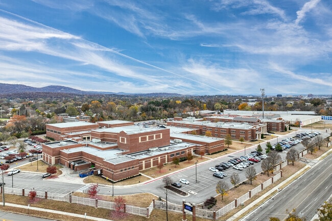 Lee High School shares the same campus as New Century Technology High School.