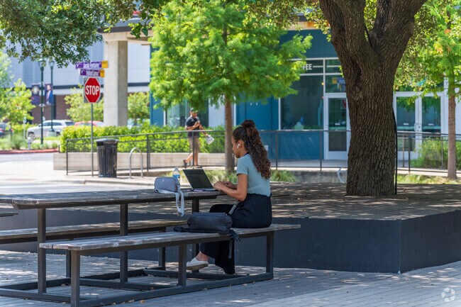 Residents of Skyview frequently relax by strolling through tree-lined streets.