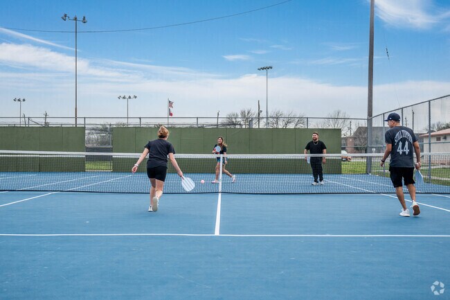 Residents enjoy the newly added tennis and pickleball courts at Wilkie Park in Jacinto City.