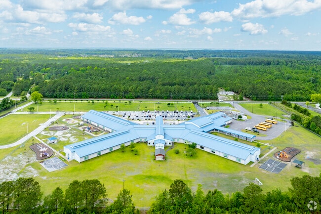 Jessie Mae Monroe Elementary is recognized among the top 50% of public schools in North Carolina, with 56% math proficiency and 49% reading proficiency.