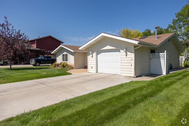 Well-maintained homes with spacious driveways in North Central Helena.