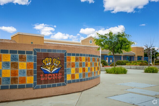 Handprints of students seen in front of Susan La Vorgna Elementary School in Winchester.