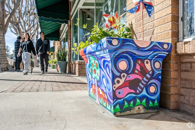 Old Town Tustin features public art in various places, including planter pots and seats.