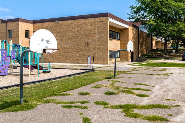 Stop for some basketball  at The Heights Community School in the Greater East Side.