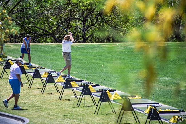 Practice your drive on the range at Heritage Highlands at Dove Mountain.