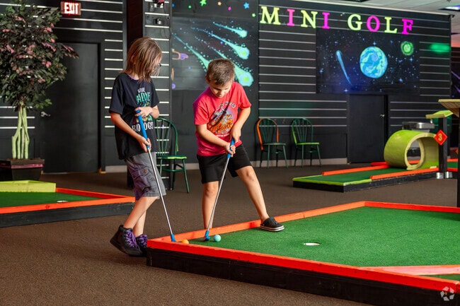 Play some glow in the dark mini golf at the West Ridge Mall in Ellenwand.