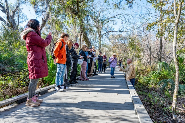 Students and nature enthusiasts enjoy the trails at Brooker Creek Preserve nearby to East Lake.